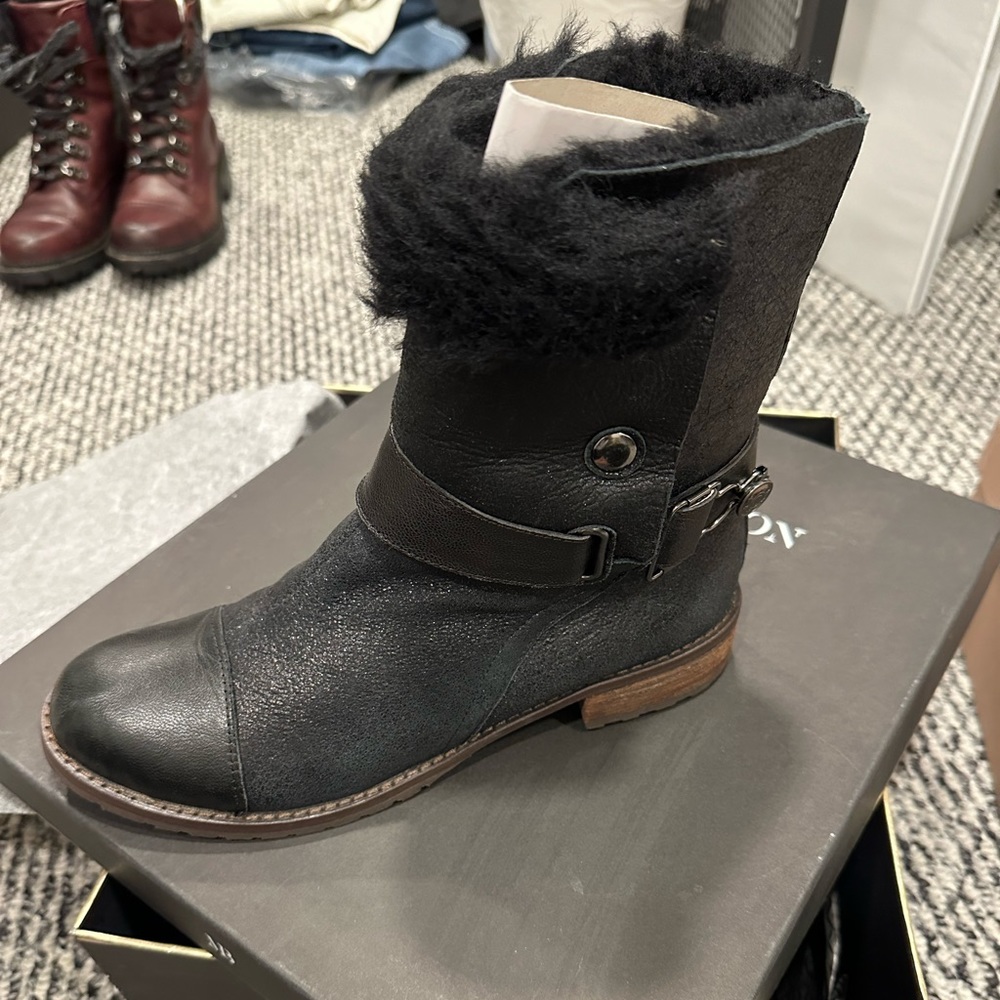 Black boots with buckle detail